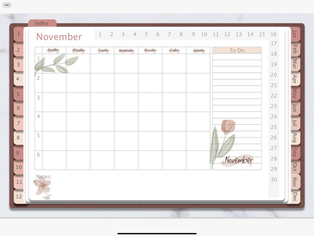 a monthly planner page of a digital planner with digital flower and days stickers in a rose gold color palatte